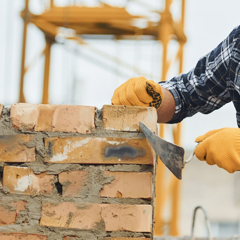 laying-bricks-construction